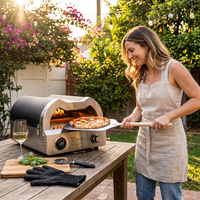 12 In. Propane Pizza Oven, Outdoor Pizza Oven in Black with Rotating Pizza Stone, Glove and Pizza Cutter — Lifestyle